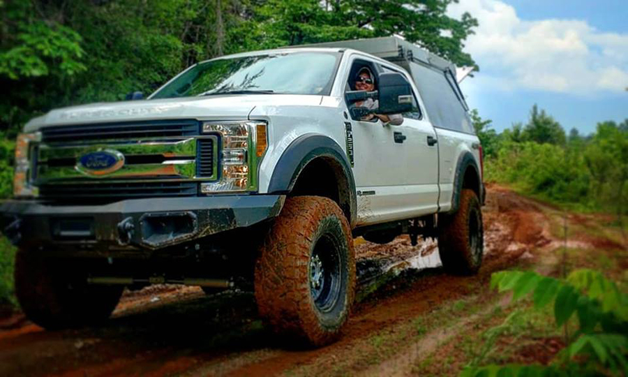 overland ford f250 stx in mud terrain